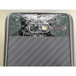 Замена линзы стекла дверцы аккумуляторной батареи Motorola Droid RAZR M